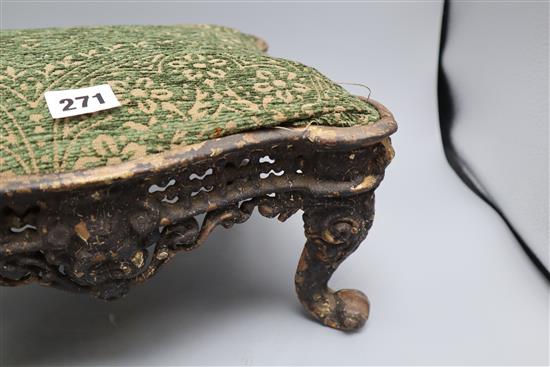 An American cast iron footstool